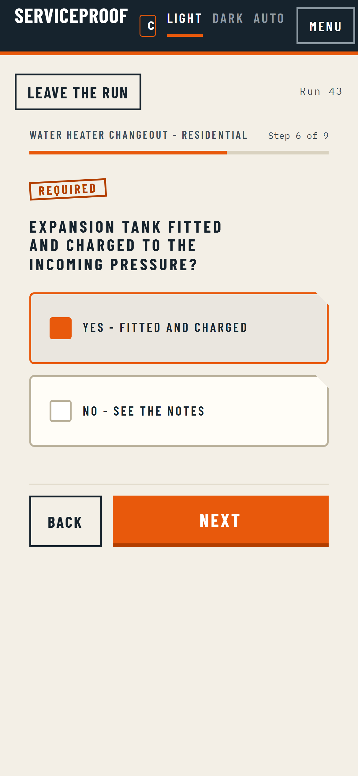 A yes-or-no workflow step on a phone, with both answers as full-width buttons.