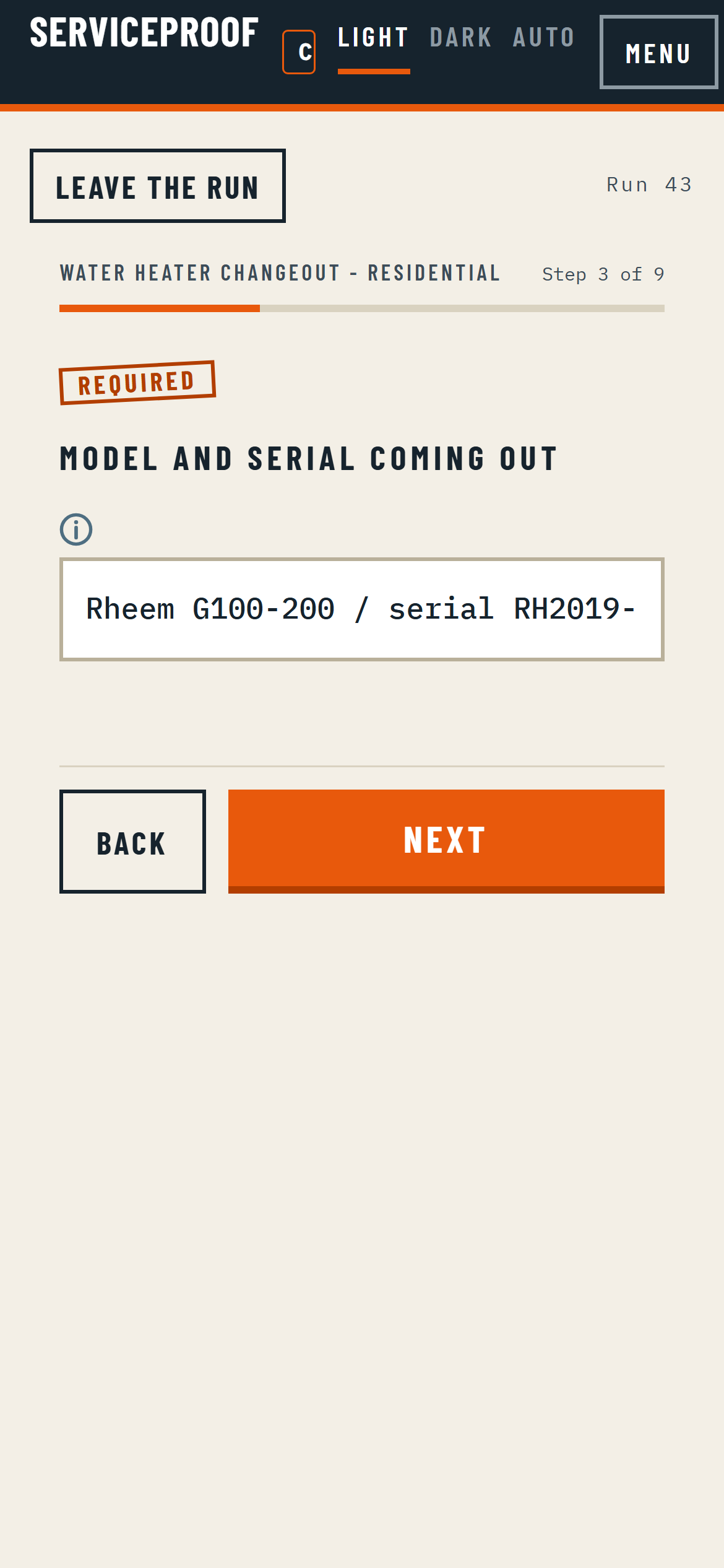 A workflow step running on a phone, capturing an equipment serial number straight off the data plate.